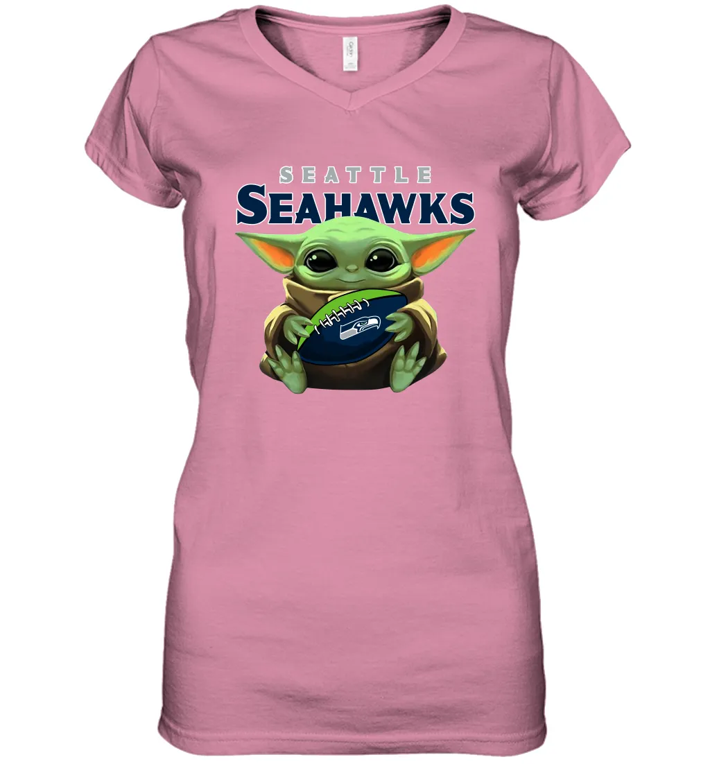 Baby Yoda Loves The Seattle Seahawks Star Wars Baby Yoda Hugs Seahawks NFL Womens V-Neck T-Shirt